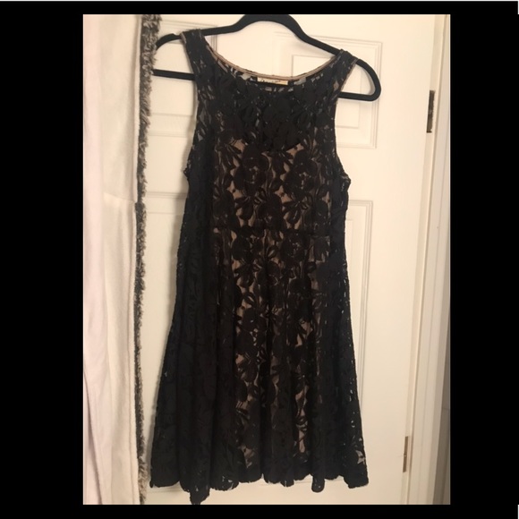 black lace dress with tan underneath